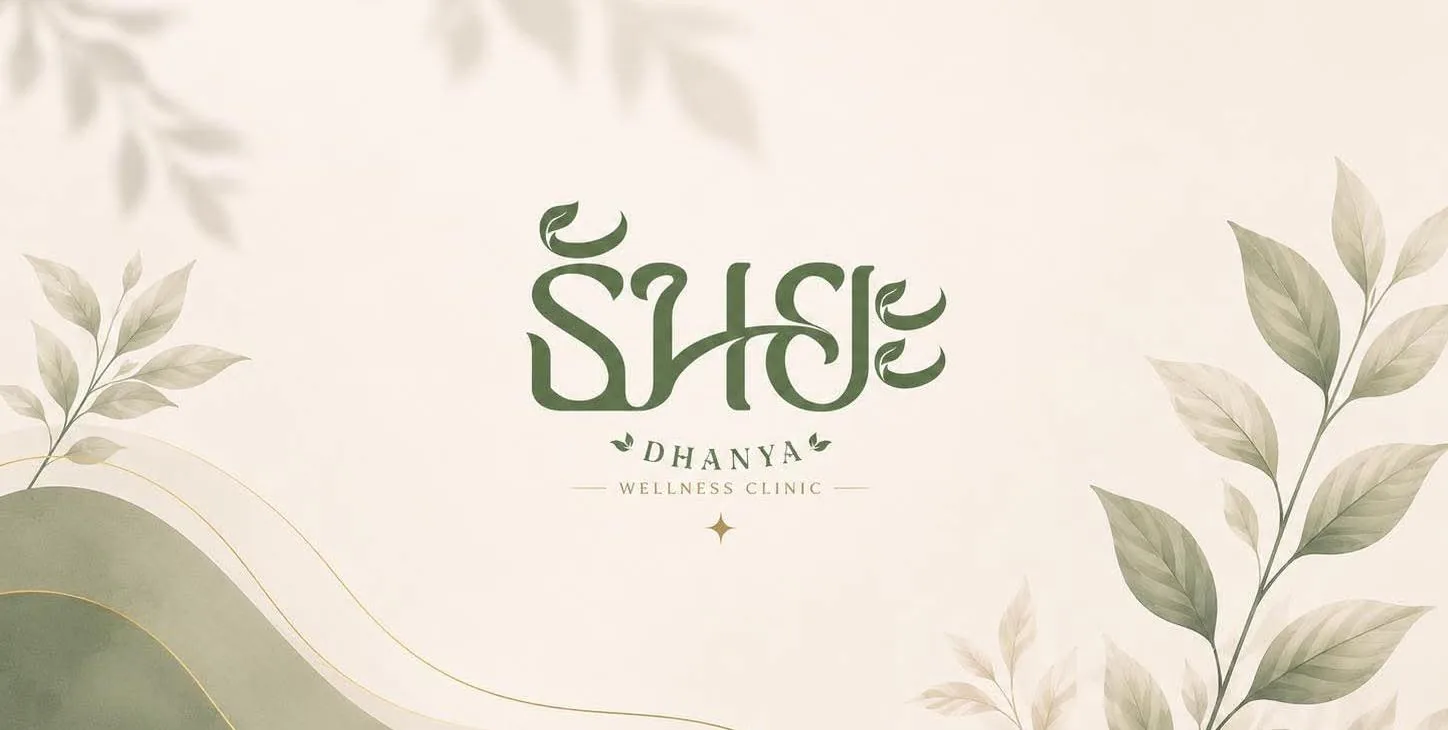 Dhanya Wellness Clinic logo on a cream background with sage-green leaves